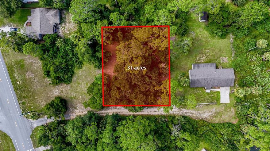 Build Your Coastal Dream in Flagler Beach! Imagine designing your perfect retreat just steps from the Intracoastal Waterway and moments from the Atlantic Ocean. High & dry, with the coveted Zone X designation! Use any builder with no time frame to build! With nearly a third of an acre(.31 acres) to build on, this oversized parcel can fit a wide array of floorplans and designs! Private location, but do not let this country setting fool you because you right in the heart of Flagler beach! This unimproved parcel offers the rare flexibility to be purchased individually or combined with two adjacent lots, creating over 1.13 acres of endless possibilities! Whether you envision a multi-generational compound, a spacious single-family home, or a coastal getaway, the location is unmatched—close to unique shops, local dining, boat ramps, scenic trails, and the laid-back Flagler Beach lifestyle.