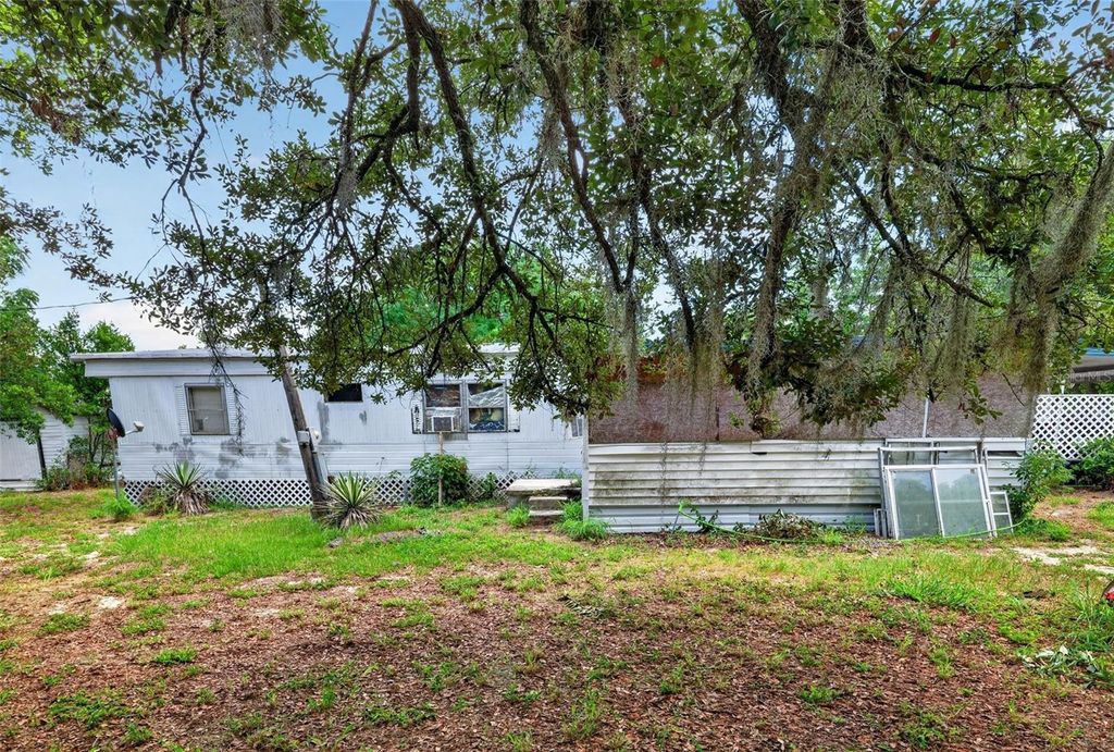 Photo of 3200 Windy Hill Road, Haines City, FL 33844 (MLS # TB8512193)