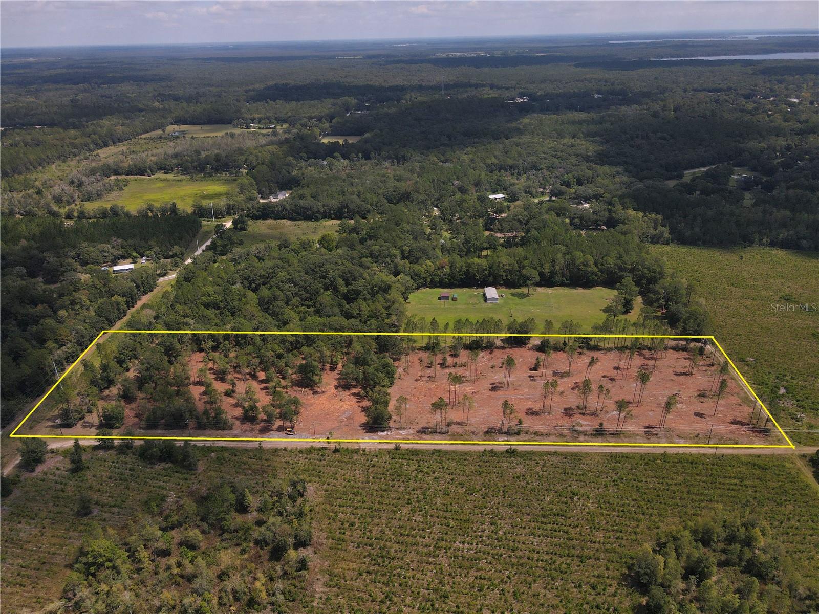 Private 10-acre piece of land next to a few thousand acres of forest. Just off of CR 1475 in the country outside of the Town of Waldo. Has a stand of mixed hardwood trees and pine trees on it. Plenty of mature oak trees available to provide acorns for the wildlife. When you first drive in, the front half of property is open and would be a good area for a pasture. Back half of property is more wooded. This is the last smaller parcel before the forest begins. Meaning it can be used as a recreational piece for hunting, trail riding, and other desired activities in the wild. A lot of "Wild Game" frequent the property! Also, this property would make a good country homestead for your personal residence. You could build a traditional home or put a manufactured home on the property. No neighborhood restrictions. One can have pets and farm animals. A Short drive on a dirt road to the property. Close to town, yet far enough out to be in the country. Just 20 minutes to Gainesville. A must see!