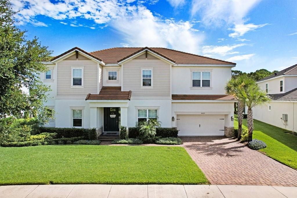 Set within the desirable Whitfield Preserve neighborhood of Starkey Ranch, this home offers a combination of functional design and thoughtful upgrades. The property includes five bedrooms, with two owner’s suites, and features a saltwater pool, an outdoor kitchen, and water views that create a peaceful backdrop.
Inside, a wide foyer opens into a layout that balances open spaces with private areas. To one side, there’s a dedicated office space and powder bathroom, while opposite, a formal dining area provides a comfortable setting for meals. The two-story great room is centered around a custom-built feature wall, serving as a focal point for gatherings.
The kitchen is equipped for everyday cooking and entertaining, featuring two islands, high-quality cabinetry, a built-in oven and microwave, a natural gas cooktop, and a dishwasher. Under-cabinet lighting enhances visibility, while the French door refrigerator and large walk-in pantry add storage. An additional under-stair closet provides extra space.
The main floor includes one of two owner’s suites, with bamboo flooring and amazing water views. The en-suite bath has a soaking tub, dual vanities, dual closets, and a water closet for privacy. Upstairs, the second owner’s suite includes a space that can serve as a sitting or workspace. The en-suite features a soaking tub, dual vanities, and a water closet.
Three more bedrooms share a dual vanity bathroom with a separate room for the toilet, tub, and shower—designed to accommodate family or guests comfortably. A bonus room overlooks the backyard, making it ideal for a home office, playroom, or craft space, while a media room offers a dedicated spot for entertainment.
Stepping outside, the backyard is designed for relaxation and outdoor living, with a saltwater pool and a paved patio area with an outdoor kitchen. The views overlook a pond and the expansive JB Starkey Wilderness Preserve, providing a natural setting for outdoor enjoyment.
Additional features include laundry room, 3 car garage with Windsor steel garage doors, 8-foot interior doors, a durable tile roof, 10-foot ceilings, upgraded lighting fixtures, floodlights, recessed LED lighting, Moen faucets, hurricane shutters, professional landscaping with reclaimed water irrigation, Low-E dual-pane windows, R-38 attic insulation, gutters, high-efficiency air conditioning, a tankless gas water heater, and other efficiency and safety upgrades.
Located in Starkey Ranch, a community that spans 2,400 acres just off SR 54 and near the Suncoast Parkway, this home provides easy access to schools, libraries, trails, nature preserves, and a range of amenities. It’s a short drive to beaches, airports, shopping centers, medical facilities, and recreational areas.
Schedule your visit today to see how this home can fit your lifestyle.
