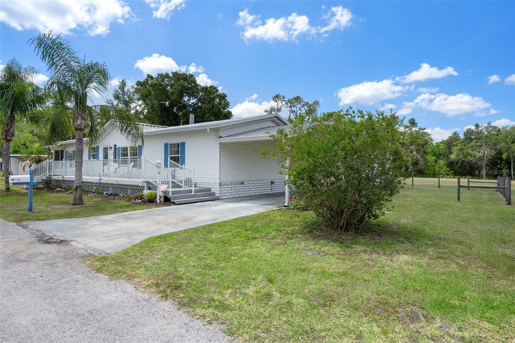 Photo of 20334 Woodside Street, Brooksville, FL 34601 (MLS # W7884330)