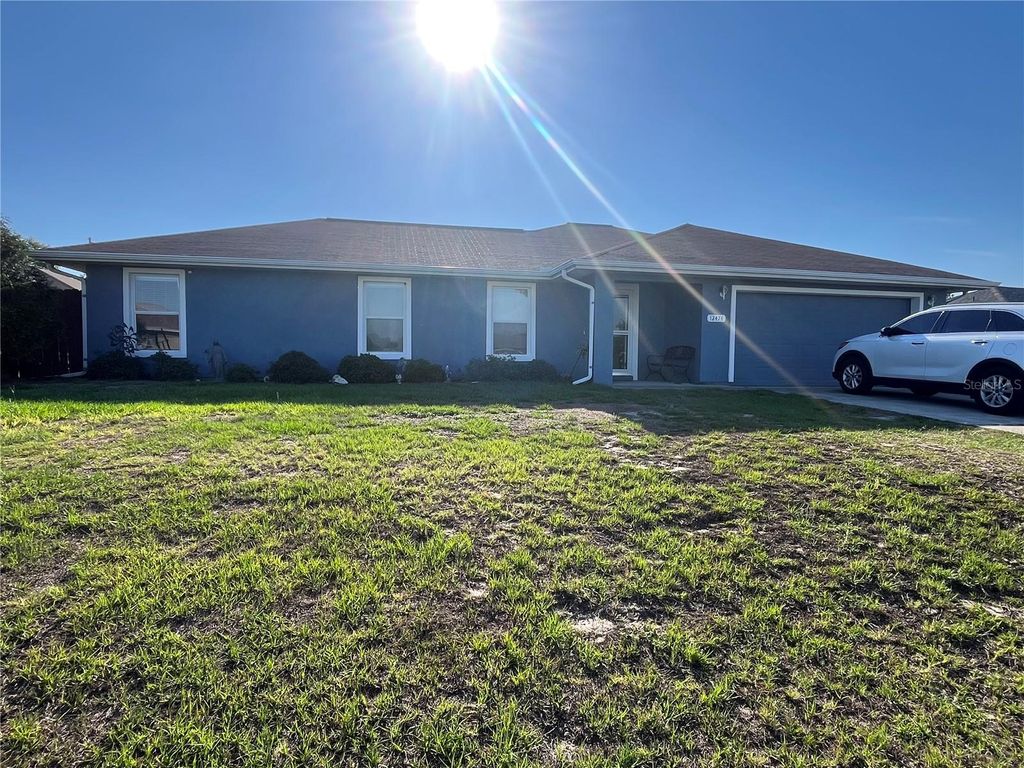 Photo of 12474 SE 100th Court, Belleview, FL 34420 (MLS # OM724871)