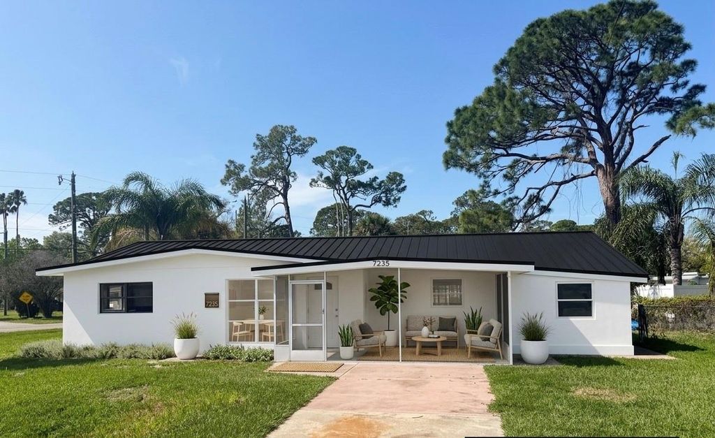 Photo of 7235 Royal Palm Drive, New Port Richey, FL 34652 (MLS # TB8482160)