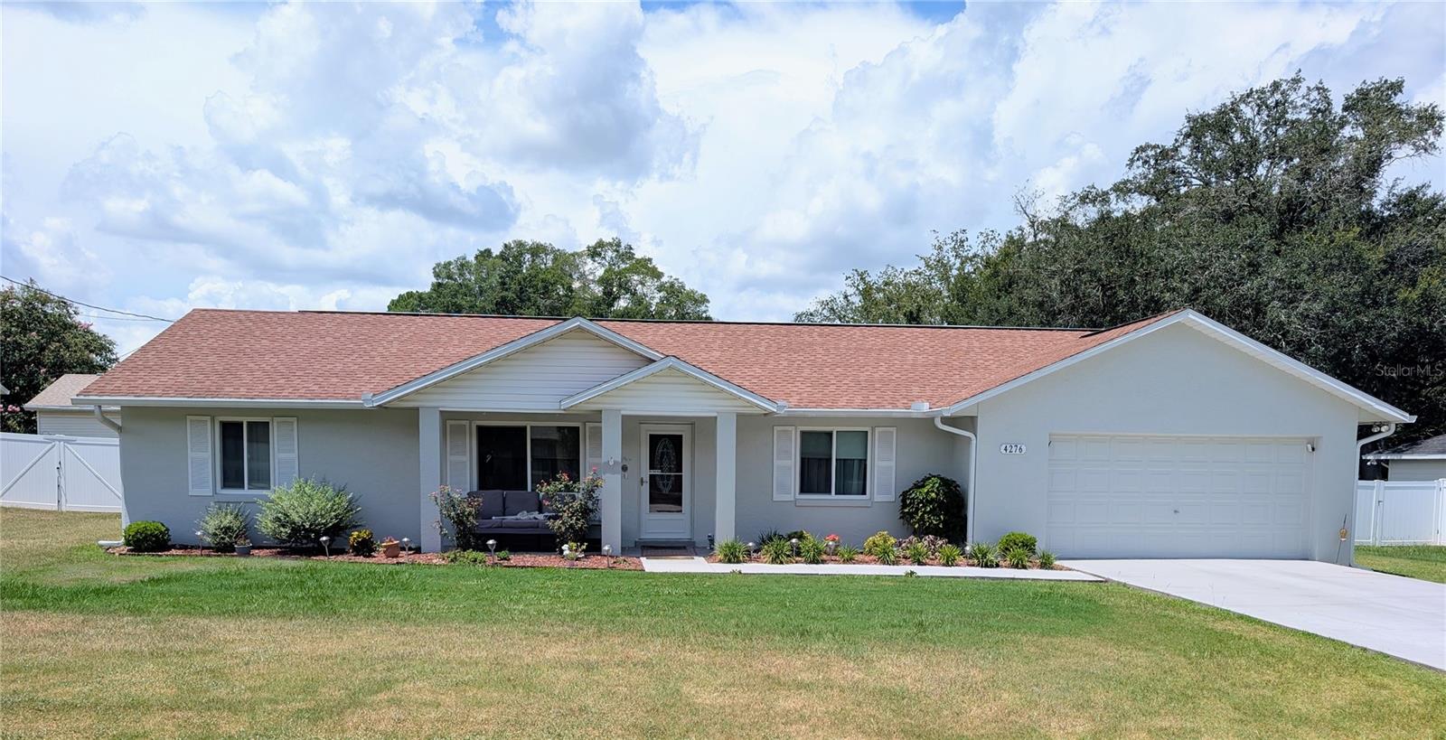 Looking for peace and quiet without sacrificing location?
This meticulously maintained 4/2 home sits on a supersized lot on a dead-end street, surrounded by well-kept properties that radiate pride of ownership. Inside, the split floor plan offers an easy flow beneath soaring 20-foot ceilings.
Enjoy multiple spaces to relax and entertain — a sun porch, screened lanai, and open patio. The garage has been professionally converted into a comfortable studio, yet can be easily restored to its original use if desired. This space can be income producing given that Silver Springs is just minutes away!
Outside, you’ll find a sparkling 28-foot pool with a-new pump, TREX decking, and a 16x12 shed. Other upgrades include a 2.5-year-old HVAC system with UV light for cleaner air, energy saving "Spec Shield" insulation in Attic ( Space Shuttle technology) Pella Windows less than 2 yrs old and a water softener.
This property is a rare combination of serenity, convenience, and smart updates — all move-in ready. Home Warranty in place that is transferable to new owners! * Seller is in process of packing, hence the limited pictures. Stay tuned for Pro Pictures and video!