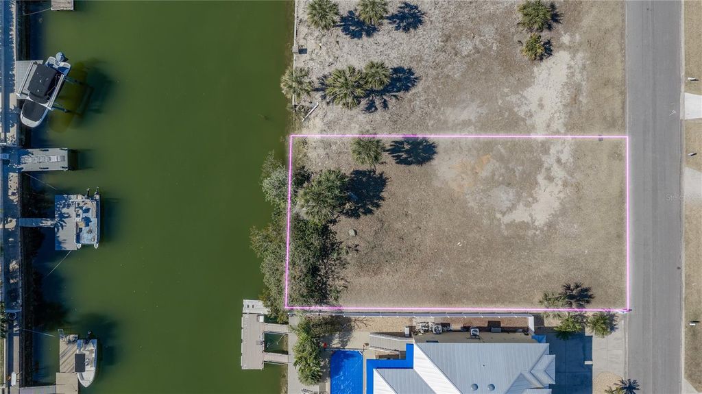 Photo of 4348 Tahiti Drive, Hernando Beach, FL 34607 (MLS # TB8474957)