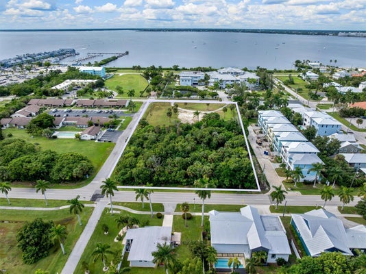 925 W MARION AVE, PUNTA GORDA, FL 33950 - Image 03541e9a24f9cc08ca5a7e57b8a42bd5/1746050890