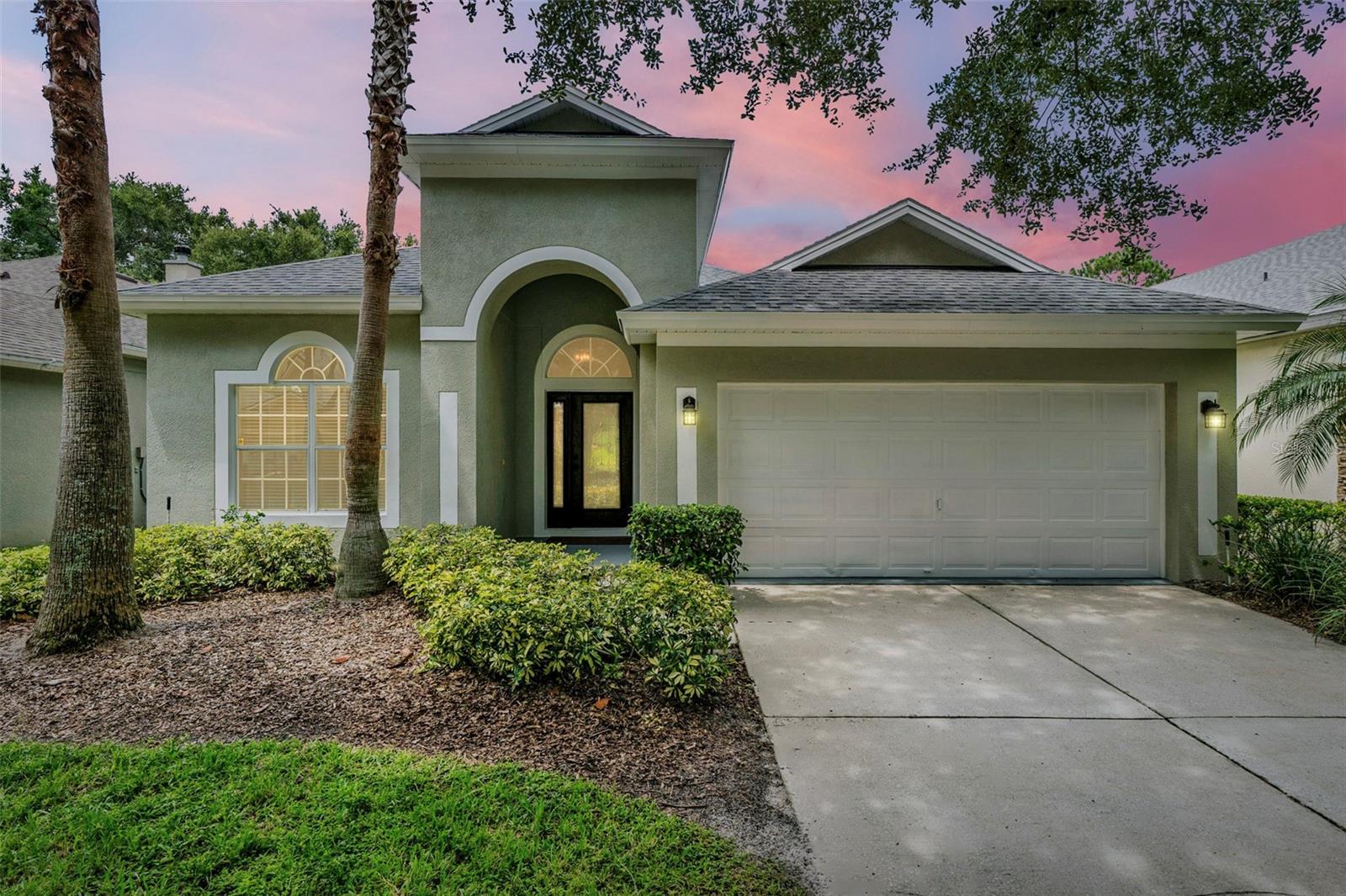 Welcome to your dream home in the highly sought-after, GUARD-GATED GOLF COMMUNITY of Heathrow in Lake Mary, FL! This stunning NEWLY UPDATED 3 bedroom, 2 full bath + OFFICE home offers the perfect blend of luxury, comfort, and Florida lifestyle. Step inside to discover SOARING CEILINGS and an OPEN-CONCEPT FLOOR PLAN designed for effortless entertaining and everyday living. *BRAND NEW HVAC 2025* *NEWER ROOF 2021* Recent updates include new MODERN LIGHT FIXTURES, FRESH INTERIOR AND EXTERIOR PAINT, BRAND NEW QUARTZ COUNTERTOPS and CABINET HARDWARE that add a sleek, contemporary touch to the kitchen. The split bedroom layout offers privacy, while the living and dining areas provide a seamless flow for both everyday living and entertaining. The PRIVATE OFFICE is conveniently located in the front of the home with double doors and a beautiful oversized window! Step outside to the PRIVATE SCREENED-IN PATIO and enjoy serene conservation views with no rear neighbors—perfect for relaxing evenings or morning coffee. The spacious primary bedroom features a large en-suite complete with double vanities, a large soaking tub, glass shower and WALK-IN CLOSET! Located in a GUARD-GATED COMMUNITY WITH 24/7 SECURITY that offers RESORT-STYLE LIVING, residents enjoy access to a SPARKLING COMMUNITY POOL, FULLY EQUIPPED FITNESS CENTER, TENNIS COURTS, PLAYGROUND, PARK, and a COMMUNITY DOCK. CONVENIENTLY LOCATED near shopping, dining, and major roadways. Schedule your private tour today and experience the lifestyle you've been dreaming of!