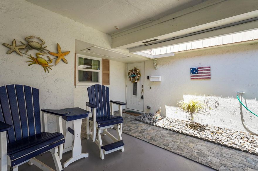 Step into this inviting 2-bedroom, 2-bath villa nestled in one of Sarasota’s most cherished 55+ communities—Strathmore Riverside Villas. This well-kept home combines comfort, convenience, and a relaxed Florida feel, creating the perfect place to enjoy year-round living. Inside, you’ll find a bright and open layout that makes everyday living effortless. The spacious living and dining area provides plenty of room to entertain or simply unwind. The kitchen is both practical and welcoming, offering ample cabinetry, modern appliances, and a breakfast bar ideal for quick meals or morning conversations. The primary bedroom offers a peaceful escape with a walk-in closet and a freshly renovated en-suite bath featuring a contemporary glass shower. Sunshine fills the living room, where views of the lush community landscaping create a serene backdrop. Additional features include an attached carport with extra storage and a dedicated laundry room—conveniences that truly make life easier. Recent improvements bring added value and peace of mind: updated under-sink plumbing (2024), new plumbing fixtures (2024), a remodeled primary bathroom (2024), updated electrical outlets and switches (2024), new ceiling fans (2024), new exterior doors and windows (2023), fresh interior paint (2024), and new refrigerator and dishwasher (2024). Life in Strathmore Riverside Villas means enjoying resort-style amenities every day. Take advantage of the heated pool, fitness center, clubhouse, library, shuffleboard courts, boat dockage (first-come, first-served), and a kayak launch—everything you need to embrace the Florida lifestyle. All of this is just minutes from Siesta Key Beach, excellent dining, shopping, and the cultural energy of downtown Sarasota. If you’re seeking a move-in ready home in a friendly, active community, this villa is a must-see. (Maximum of 2 pets allowed with size restrictions.)