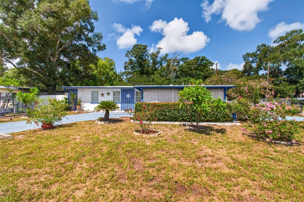 Photo of 568 Manor Drive, Dunedin, FL 34698 (MLS # TB8538759)
