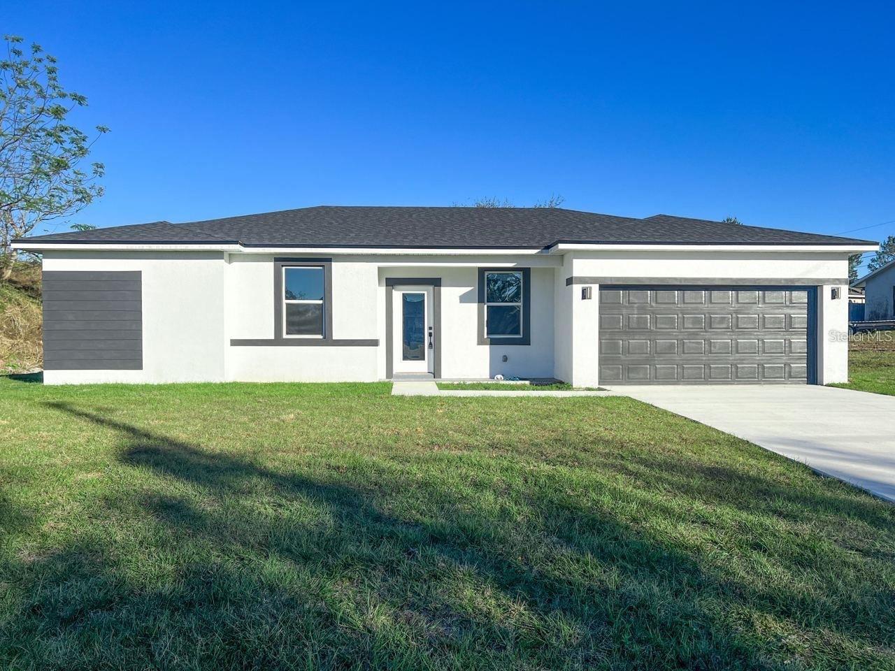 AMAZING home has all the extras you have been looking for, including granite countertops, stainless steel appliances, shaker kitchen cabinets with 42" uppers, fully tiled shower and tub surrounds, and super-durable luxury vinyl plank flooring throughout. The outside features an upgraded brick paver service walk and driveway, as well as a new fully sodded yard. Smart energy-saving features like highly efficient water heaters and mechanicals, Low-E windows, and low-flow fixtures will keep electricity bills low. The spacious open floor plan allows ample space for entertaining with an open concept Kitchen/Great Room and multiple dining areas including a breezy covered lanai. Make your appointment to view it now!