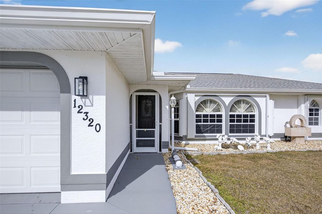 Photo of 12320 Evelyn Avenue, Port Charlotte, FL 33981 (MLS # O6376664)