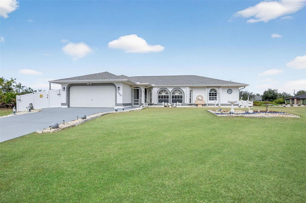 Photo of 12320 Evelyn Avenue, Port Charlotte, FL 33981 (MLS # O6376664)