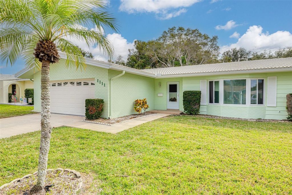 Photo of 1111 Mclean Street, Dunedin, FL 34698 (MLS # TB8450949)