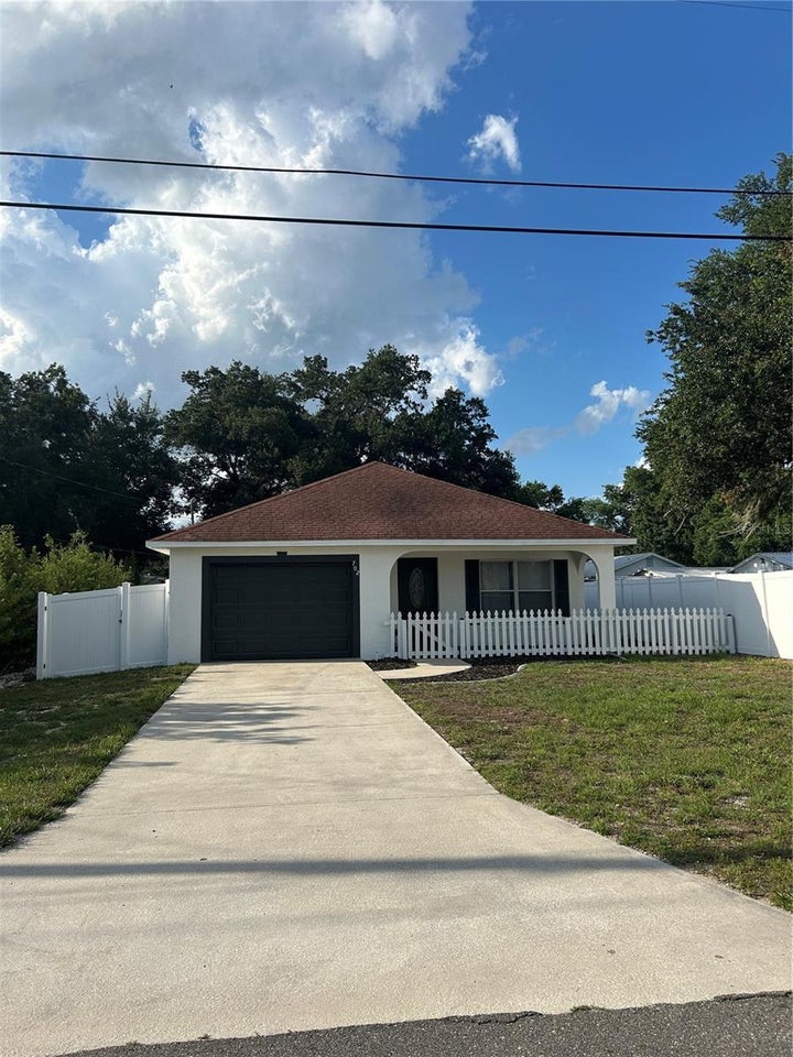 Photo 1 of 14 — 702 LEMON AVE, DUNDEE, FL 33838