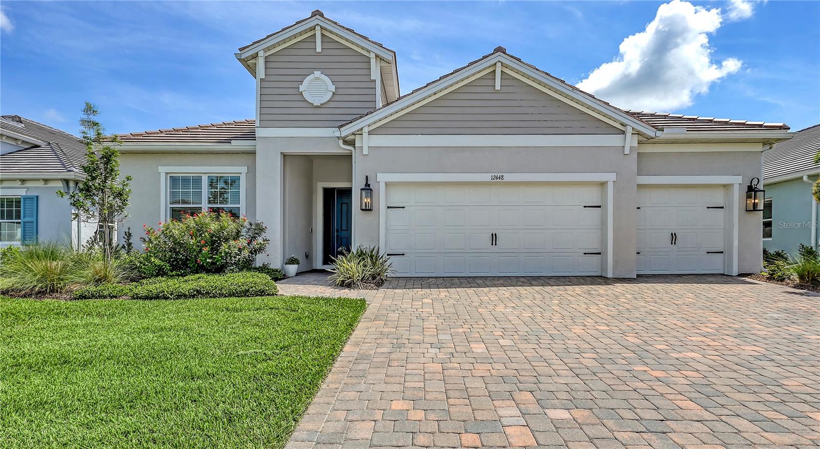 This beautifully upgraded three-bedroom, three-bathroom home offers 2,520 square feet of refined living space in the desirable Avelina community of Wellen Park. Up to $92,000 in Builder Design and structural upgrades as well as owner quality design in this residence combines luxury, functionality, and thoughtful design.
The open-concept layout welcomes you with vinyl plank flooring, custom window treatments, and an abundance of natural light. The chef’s kitchen is a true centerpiece, featuring quartz countertops, high-end appliances, undermount lighting, and ceiling-height luxury cabinetry that offers exceptional storage and style.
Adjacent to the kitchen is a great room with soaring tray ceilings, seamlessly flowing into a massive, covered patio—perfect for entertaining. The patio is pre-plumbed for an outdoor kitchen and sink, and includes a pool pre-wire package, making it easy to create your dream outdoor retreat.
The primary suite is a sanctuary, highlighted by a huge walk-in closet with custom high-end shelving—a favorite feature of the current owner. Each bathroom is thoughtfully designed, and the laundry room adds convenience with built-in cabinetry, a laundry tub, and Corian countertops.
Additional features include hurricane impact windows, pocket sliders, and elegant lighting fixtures throughout. Located in a maintenance-free, close-knit community, this home offers the perfect blend of comfort, sophistication, and Florida lifestyle.