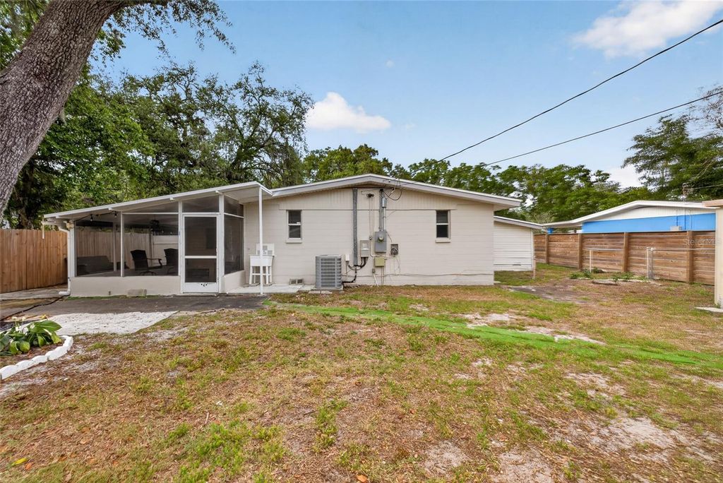 Photo of 924 Lakewood Ave, Tampa, FL 33613 (MLS # TB8496470)