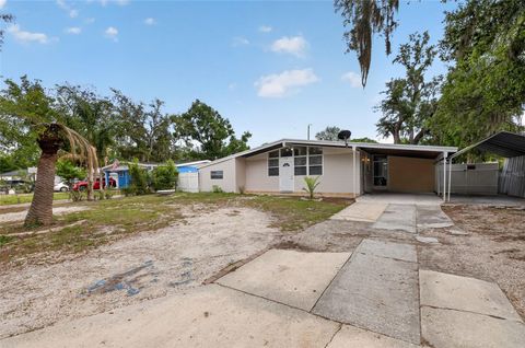 Photo of 924 Lakewood Ave, Tampa, FL 33613 (MLS # TB8496470)