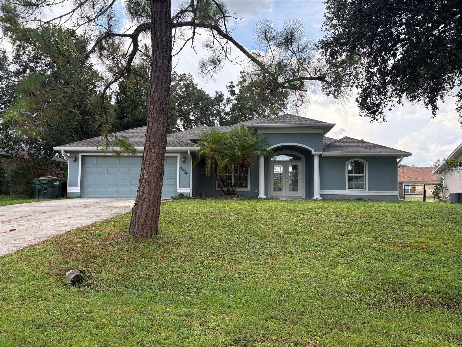 Beautiful pool home with high ceiling (11 ft) in living room, vaults in kitchen/dining and double step ceiling in family room. Formal dining room. Breakfast nook with aquarium glass looking to pool/lanai area. Tile flooring except bedrooms which have brand-new carpet. Primary bedroom has two walk-in closets and step ceiling. Roof 2020. Fresh interior paint and pool deck freshly painted too (2024). Exterior recently painted. Split bedroom plan. Screened pool with fountain. Fenced back yard. City water and septic tank.