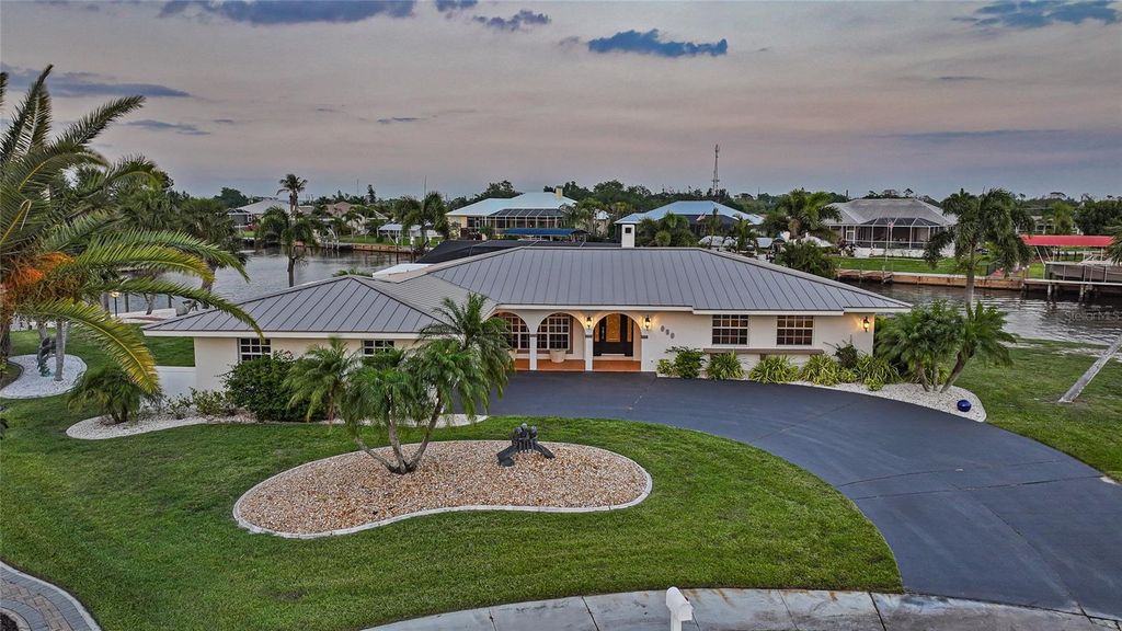 Photo of 374 Severin Road SE, Port Charlotte, FL 33952 (MLS # C7524891)