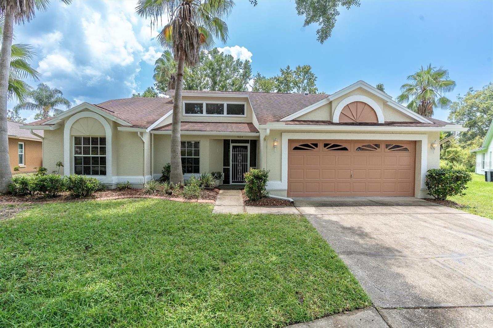 DON’T MISS THIS MOVE IN READY HOME This Light and Bright 3Bd. 2 Bath Home is located on a Quiet Cul-de-sac in the Mill Run Community. Walk through the Front Door into a Wide-Open Great Room with NEW Luxury Vinyl Plank Flooring, 17’ Ceilings with Transom Windows, and Sliding Glass Door Access to a Large Screen Porch. Located right next to the Kitchen, the Dining Area will accommodate a Large Table and has Ample Wall Space for a China Cabinet and or Hutch. Speaking of the Kitchen, how about NEW White Cabinets and Pantry Cabinet, Granite Counter-Tops, Tile Back-Splash, Tile Floors, Breakfast Area with Bay Windows and Sliding Glass Door Access to the Screened Porch. The Floor Plan is Split which Affords Privacy and Distance from the Guest Bedrooms. The Master Bedroom is Large with Plenty of Wall Space, Sliding Glass Door Access to the Screened Porch, and a Walk-In Closet; all Connecting to an En-Suite Master Bath with Granite Counter-Tops, Double Sinks, NEW Cabinets, Soaking Tub and Glass Enclosed Shower. On the Opposite side of the Home, you’ll find 2 Good Sized Guest Bedrooms, and Guest Bath with NEW Cabinets, Granite Counter Tops and Tub/Shower. The Inside Laundry Room leads into a 2 Car Garage. Step Outside to a 15’ X 14’ Large Screened Porch, leading to a 14’ X 6’ outdoor patio. Recent updates are as follows: NEW Interior Paint 2025, NEW Exterior Paint 2025, NEW Kitchen Cabinets 2025, NEW Master and Guest Bath Cabinets 2025, NEW Luxury Vinyl Plank Flooring 2025, New Wood Trim and Interior Doors 2025, NEW Ceiling Fans 2025, NEW Garbage Disposal 2025, NEW A/C System 2024. Hurricane shutters are also provided. All this Plus an Over-Size Cul-Dec-Sac Homesite with Plenty of Room for Entertaining. Homeowner HOA fees are an Affordable $140.00 per year. This Home is Close to Shopping, Schools, Restaurants, Beaches, Parks and the Suncoast Parkway for Easy Access to Tampa International Airport. Call for your Appointment Today!