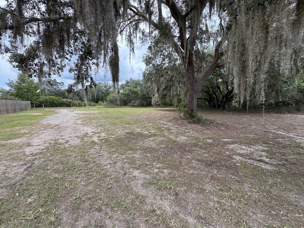 Photo of 14209 Tennessee Avenue, Astatula, FL 34705 (MLS # O6448878)
