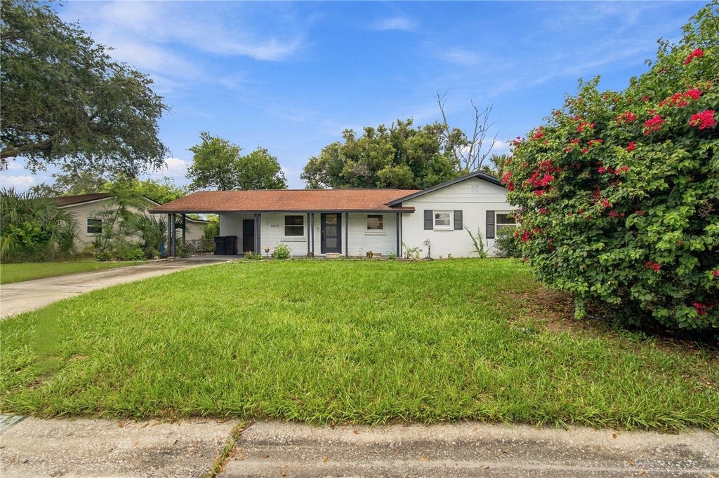 Photo of 8609 Driftwood Drive, Tampa, FL 33615 (MLS # TB8412032)
