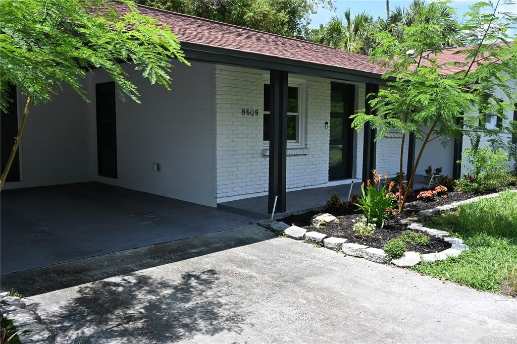 Photo of 8609 Driftwood Drive, Tampa, FL 33615 (MLS # TB8412032)