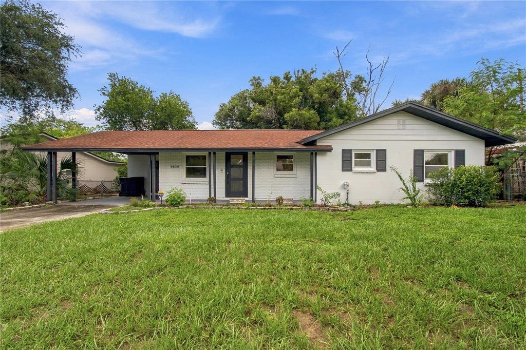 Photo of 8609 Driftwood Drive, Tampa, FL 33615 (MLS # TB8412032)