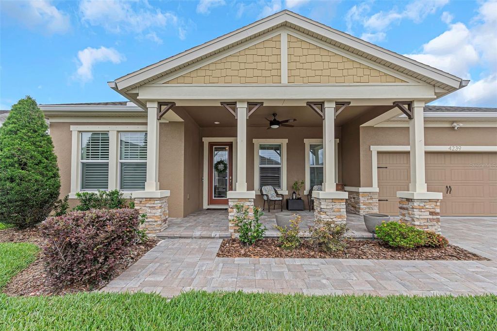 Photo of 4239 Woodland Retreat Boulevard, New Port Richey, FL 34655 (MLS # TB8470560)