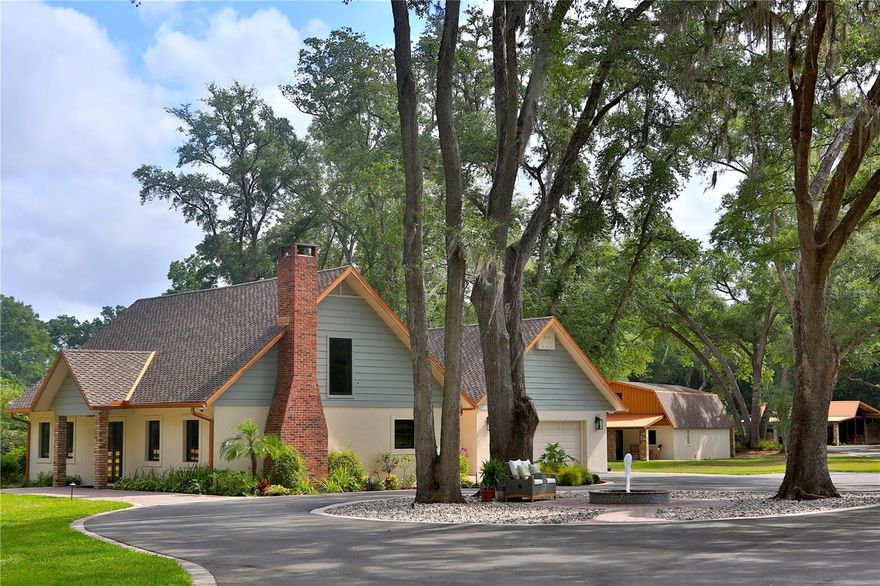 Direct access to the Greenways, you’ll enjoy paved bike paths, mountain biking trails, and miles of picturesque horse-riding trails right at your doorstep. This stunning property sits on an expansive 6.89+/—acres. It is a unique opportunity for horse enthusiasts and outdoor lovers alike, featuring a main residence, a guest residence, and a five-stall horse barn with an apartment. This impressive two-story residence boasts 2 bedrooms and 2.5 bathrooms, along with a spacious 2-car garage. The highlights include a brand-new Presidential Triple Laminate Shingle roof, elegant copper gutters, and a full-house Generac propane generator for peace of mind. Enjoy modern living with new stainless-steel appliances, custom solid wood cabinets, and beautiful granite countertops throughout. The luxurious owner's suite features a stunning back wall made of a single granite slab, and the entire home showcases heated tile floors, opting for tongue-and-groove walls instead of drywall. Cozy up by the Chicago brick gas fireplace or unwind on the expansive back paver deck. Additional features include a water softener, a dedicated laundry room, and a convenient garage door opener. Perfect for guests or Airbnb rental potential, this charming residence includes two bedrooms and three bathrooms, each with its own private entrance or the option to connect. The property features a full kitchen downstairs and a kitchenette upstairs, both adorned with granite finishes. Enjoy the benefits of new mini-split units, a full gym/workout room (which can be easily converted into a third bedroom), and a separate laundry room. Relax on either the front or rear covered porches. The well-appointed barn features five stalls, a feed room, a tack room, and two wash racks equipped with hot water. A cozy sitting area makes it a perfect gathering spot after a day of riding. Barn Apartment: This private one-bedroom, one-bathroom apartment features a kitchenette and a mini-split A/C unit, ideal for added privacy or accommodating guests. This fully fenced and cross-fenced property features five paddocks equipped with concrete waterers. An inviting asphalt driveway with concrete curbing leads to the custom solid aluminum gate. Enjoy evenings by the fire pit, appreciate the serene lighted fountain, and revel in the plentiful outdoor lighting that enhances this beautiful estate. Rare opportunity to own a remarkable property that truly has it all!