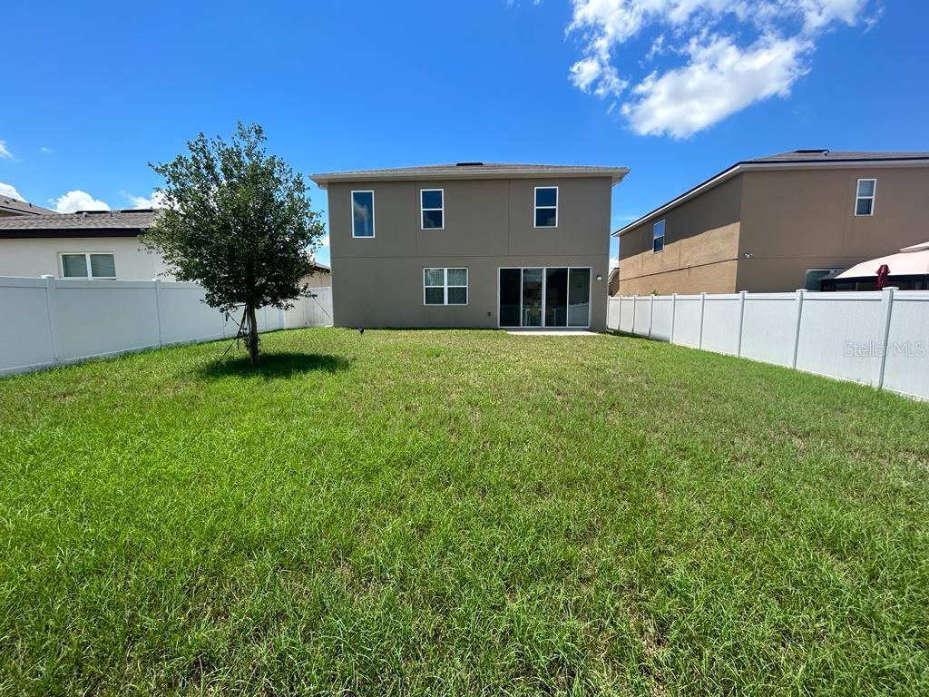 Photo of 680 Meadow Pointe Drive, Haines City, FL 33844 (MLS # S5158505)