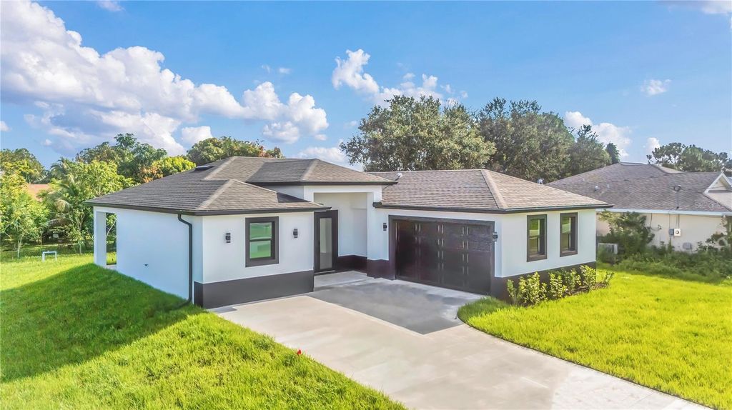 Photo of 1180 Vernon Avenue, Port Charlotte, FL 33948 (MLS # OM713174)