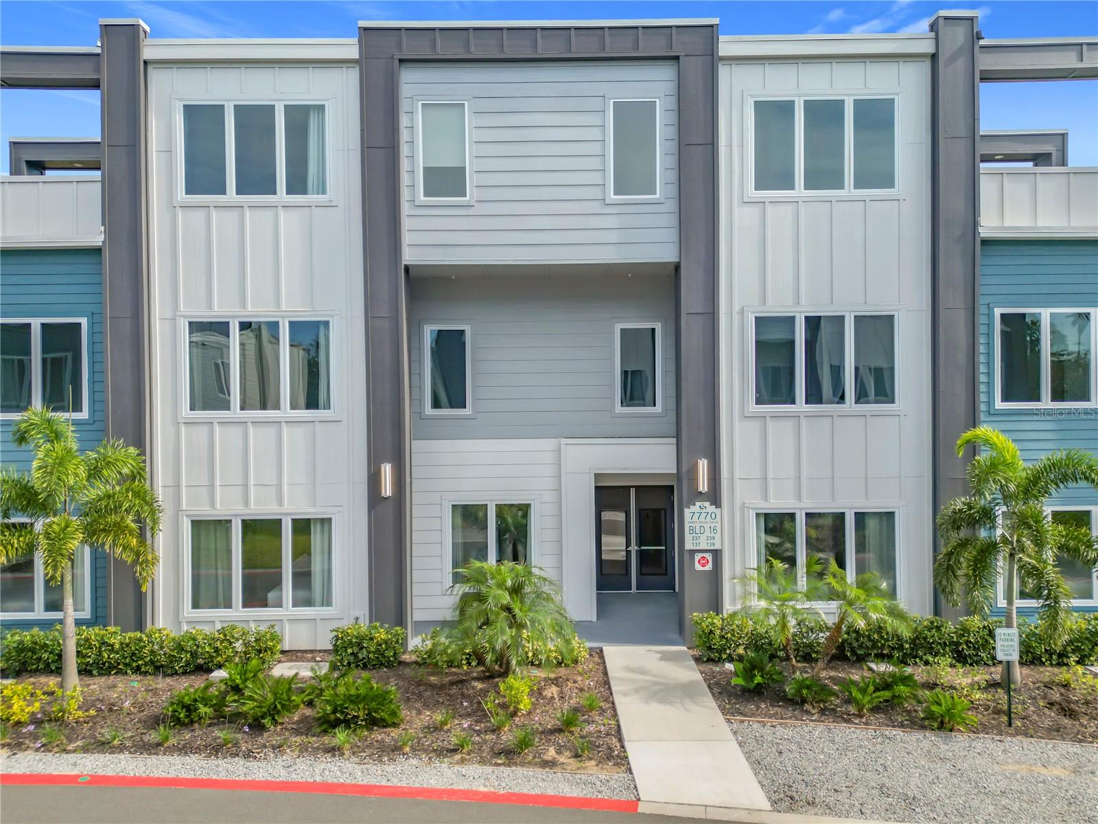 This sleek, modern ground-floor condo in the renowned Spectrum at Reunion Resort offers the perfect combination of style, comfort, and convenience. Located just minutes from Walt Disney World, this furnished 3-bedroom, 3-bathroom home is move-in ready. The open floor plan features contemporary finishes, a spacious kitchen with stainless steel appliances, a gas stove, and a stylish island. The natural light-filled living area opens to a large paved patio—perfect for relaxing or hosting guests. The master suite includes a walk-in closet and an ensuite bathroom with a walk-in shower and dual vanities. A laundry closet with a stackable washer and dryer adds to the convenience.
Enjoy world-class amenities, including a resort-style pool, a state-of-the-art gym, and a water park with a lazy river and slides. Reunion Resort spans 2,300 acres with three championship golf courses designed by Nicklaus, Palmer, and Watson, as well as tennis courts, multiple pools, fine dining options, and more.
Don’t miss the chance to live in luxury—schedule your viewing today.