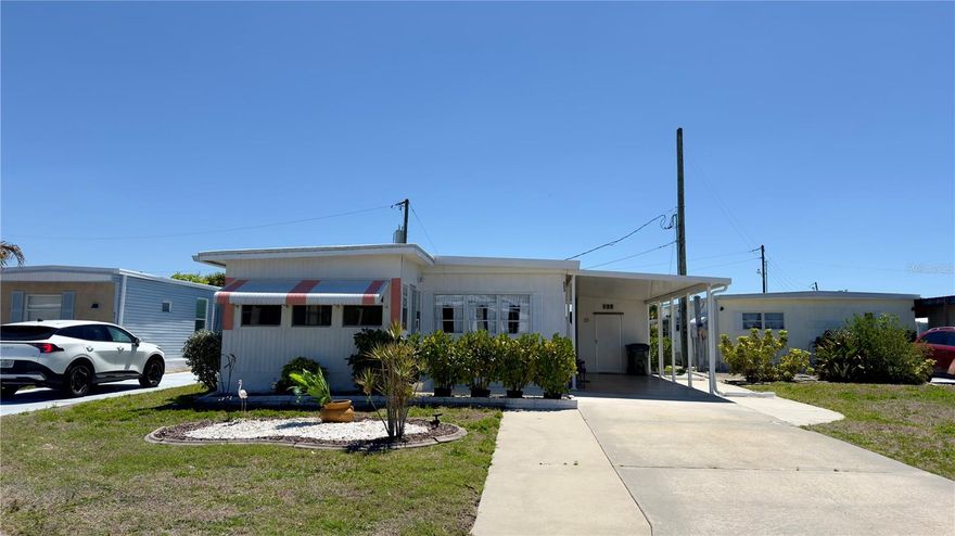 Cute as a button and fully furnished! Move-in ready, priced to sell, and sure to go fast. Experience the best of Florida’s retirement lifestyle; Harbor Cove, a sought-after 55+ waterfront community along the scenic Myakka River, filled with resort-style amenities. This 2 bed/2 bath home, styled with warm, charm, and a clean, modern feel is ready for it's new owner. **Metal Roof, New Carport, HVAC 2020**. Extra-long driveway with additional parking pad, shed, paved patio. Large primary bedroom featuring an ensuite bathroom. Spacious guest bedroom with ample closet space. Welcoming and bright sun room filled with natural light, perfect for morning coffee or comfortably hosting overnight guests. City water and sewer. $99 a year land lease, NO HOA fees, NO LOT rent. Resort-style amenities with two sparkling heated pools, a relaxing spa, a well-equipped fitness center, a clubhouse overlooking the stunning marina, shuffleboard, horseshoes, pickleball, tennis, and bocce courts. Socialize and stay active with dances, parties, water aerobics, fitness classes, art classes, woodworking, golf cart parades, bingo, dances, and more. Boat clubs, a craft room, picnics on the patio, golf clubs, bowling clubs and much more. There is plenty of wildlife to enjoy in this 190-acre community; herons, egrets, cranes, ibis, parrots, even alligators and manatees! Conveniently located within minutes of Downtown Wellen Park, Costco, shopping, restaurants, and a short drive to beautiful Gulf Beaches. Schedule a viewing today and let this dream home become your reality!