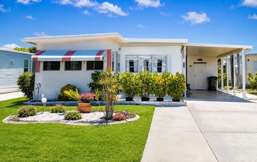 Cute as a button and fully furnished! Move-in ready, priced to sell, and sure to go fast. Experience the best of Florida’s retirement lifestyle; Harbor Cove, a sought-after 55+ waterfront community along the scenic Myakka River, filled with resort-style amenities. This 2 bed/2 bath home, styled with warm, charm, and a clean, modern feel is ready for it's new owner. **Metal Roof, New Carport, HVAC 2020**. Extra-long driveway with additional parking pad, shed, paved patio. Large primary bedroom featuring an ensuite bathroom. Spacious guest bedroom with ample closet space. Welcoming and bright sun room filled with natural light, perfect for morning coffee or comfortably hosting overnight guests. City water and sewer. $99 a year land lease, NO HOA fees, NO LOT rent. Resort-style amenities with two sparkling heated pools, a relaxing spa, a well-equipped fitness center, a clubhouse overlooking the stunning marina, shuffleboard, horseshoes, pickleball, tennis, and bocce courts. Socialize and stay active with dances, parties, water aerobics, fitness classes, art classes, woodworking, golf cart parades, bingo, dances, and more. Boat clubs, a craft room, picnics on the patio, golf clubs, bowling clubs and much more. There is plenty of wildlife to enjoy in this 190-acre community; herons, egrets, cranes, ibis, parrots, even alligators and manatees! Conveniently located within minutes of Downtown Wellen Park, Costco, shopping, restaurants, and a short drive to beautiful Gulf Beaches. Schedule a viewing today and let this dream home become your reality!