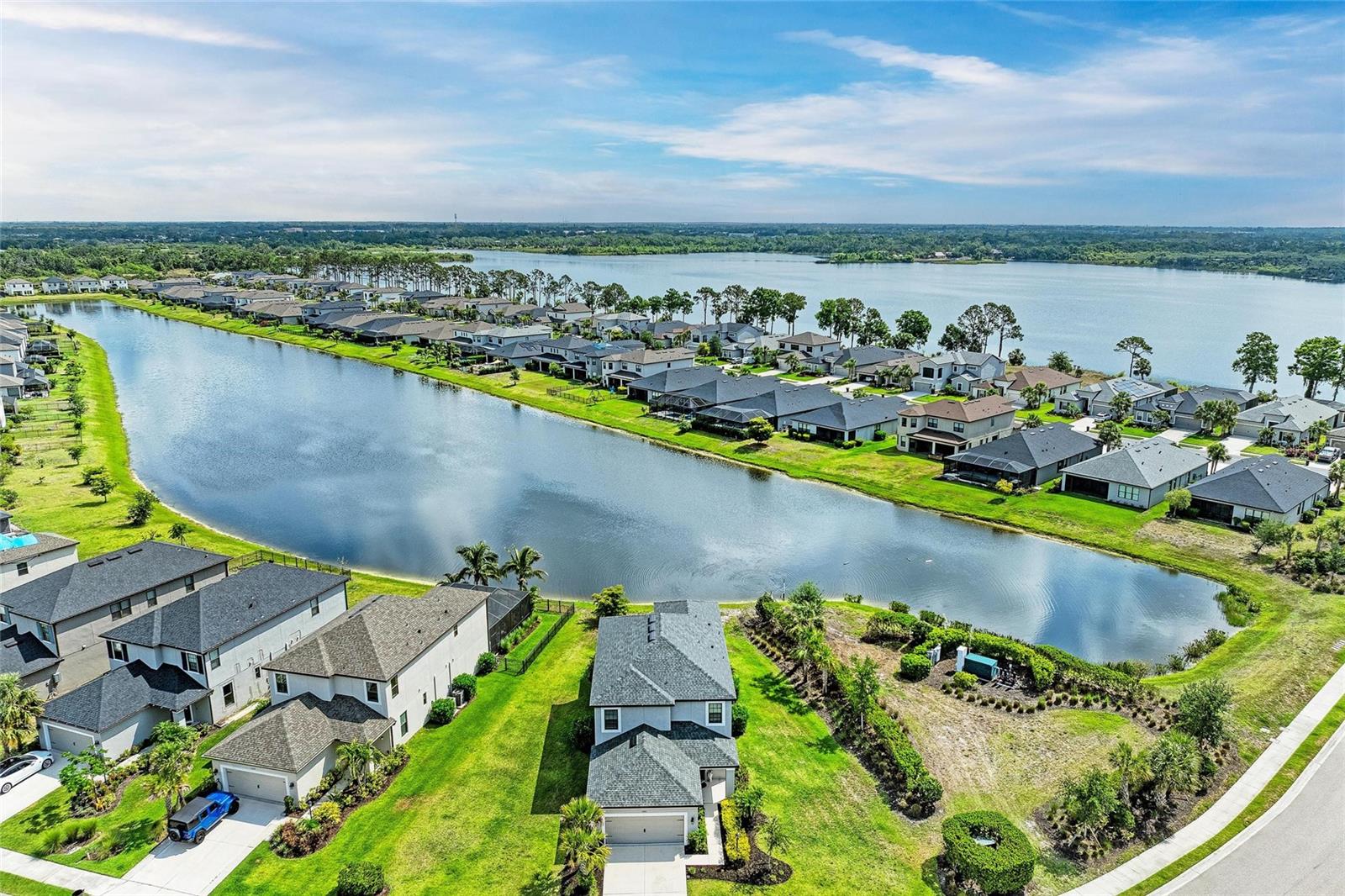 Discover the ultimate Florida lifestyle in this stunning Taylor Morrison-built home, nestled within the gated Grandview at The Heights community! Built in 2020, this 4-bedroom, 3.5-bathroom residence offers luxurious two-story living on an oversized lot, complete with serene pond views from the living room and primary suite. Imagine waking up to tranquil water views every day in this exceptional home!
With no neighbors on one side, you'll relish added peace and privacy.
This home is more than just a place to live; it's a gateway to an enriched lifestyle. Directly across the street, you'll find the community's vibrant heart, featuring Mt. Tumalo Trail Park with walking trails, sitting areas overlooking Ward Lake, exercise stations, a pet park, and open lawn areas. Residents of Grandview at The Heights also enjoy exclusive amenities including a sparkling pool and cabana area, grilling area, basketball court, and another pet park. For the outdoor enthusiast, the location is unbeatable!
Inside, 8-foot doors create an airy and grand ambiance, accentuating the spacious layout. The first-floor primary suite offers a private retreat with those coveted pond views, while additional upstairs bedrooms provide ample space for family or guests. Step outside to your private lanai – the perfect spot for morning coffee, evening relaxation, and enjoying the beautiful Florida weather.
Enjoy convenient access to boating and kayaking adventures. Not only is the home near the expansive 255-acre Ward Lake in Bradenton, but you can also rent a boat for the day at the nearby Jiggs Landing! The Heights itself is situated on approximately 200 acres in a desirable Bradenton location between State Road 70 and University Parkway, offering residents beautiful selections of homes with premium views of wooded wetlands and lush landscapes.
Beyond this exceptional community, you'll find effortless access to world-class shopping and dining at UTC Mall, the cultural attractions of Sarasota, and the charm of Lakewood Ranch. Daily conveniences are just moments away with Lowe's and Walmart nearby, and the Sarasota-Bradenton International Airport is a quick 10-minute drive. Plus, the stunning beaches of Siesta Key and Lido Key are within a 25-35 minute drive, offering endless opportunities for weekend getaways.
Don't miss this rare opportunity to combine luxurious living with an unbeatable location and an abundance of outdoor activities. And here's the best part: This property may be eligible for significant down payment assistance, with programs offering up to $39,950 in help and a forgivable second mortgage option!
Value and lifestyle like this won't last! Schedule your private showing today and start living the Florida dream!