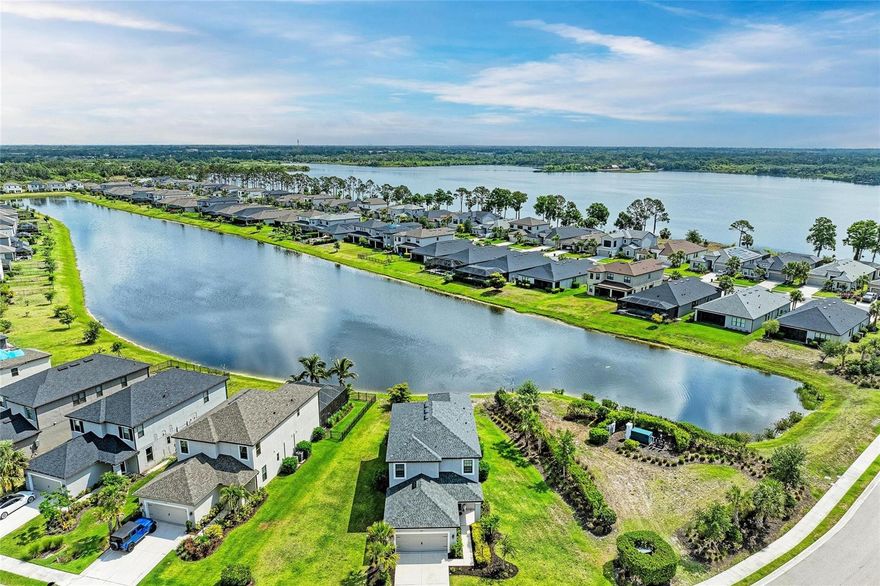 Discover the ultimate Florida lifestyle in this stunning Taylor Morrison-built home, nestled within the gated Grandview at The Heights community! Built in 2020, this 4-bedroom, 3.5-bathroom residence offers luxurious two-story living on an oversized lot, complete with serene pond views from the living room and primary suite. Imagine waking up to tranquil water views every day in this exceptional home! 
With no neighbors on one side, you'll relish added peace and privacy.
This home is more than just a place to live; it's a gateway to an enriched lifestyle. Directly across the street, you'll find the community's vibrant heart, featuring Mt. Tumalo Trail Park with walking trails, sitting areas overlooking Ward Lake, exercise stations, a pet park, and open lawn areas. Residents of Grandview at The Heights also enjoy exclusive amenities including a sparkling pool and cabana area, grilling area, basketball court, and another pet park. For the outdoor enthusiast, the location is unbeatable! 
Inside, 8-foot doors create an airy and grand ambiance, accentuating the spacious layout. The first-floor primary suite offers a private retreat with those coveted pond views, while additional upstairs bedrooms provide ample space for family or guests. Step outside to your private lanai – the perfect spot for morning coffee, evening relaxation, and enjoying the beautiful Florida weather.
Enjoy convenient access to boating and kayaking adventures. Not only is the home near the expansive 255-acre Ward Lake in Bradenton, but you can also rent a boat for the day at the nearby Jiggs Landing! The Heights itself is situated on approximately 200 acres in a desirable Bradenton location between State Road 70 and University Parkway, offering residents beautiful selections of homes with premium views of wooded wetlands and lush landscapes.
Beyond this exceptional community, you'll find effortless access to world-class shopping and dining at UTC Mall, the cultural attractions of Sarasota, and the charm of Lakewood Ranch. Daily conveniences are just moments away with Lowe's and Walmart nearby, and the Sarasota-Bradenton International Airport is a quick 10-minute drive. Plus, the stunning beaches of Siesta Key and Lido Key are within a 25-35 minute drive, offering endless opportunities for weekend getaways.
Don't miss this rare opportunity to combine luxurious living with an unbeatable location and an abundance of outdoor activities. And here's the best part: This property may be eligible for significant down payment assistance, with programs offering up to $39,950 in help and a forgivable second mortgage option!
Value and lifestyle like this won't last! Schedule your private showing today and start living the Florida dream!