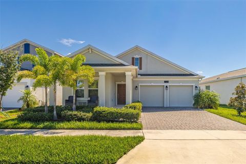 Photo of 1739 Good Neighbor Loop, Kissimmee, FL 34744 (MLS # O6347275)