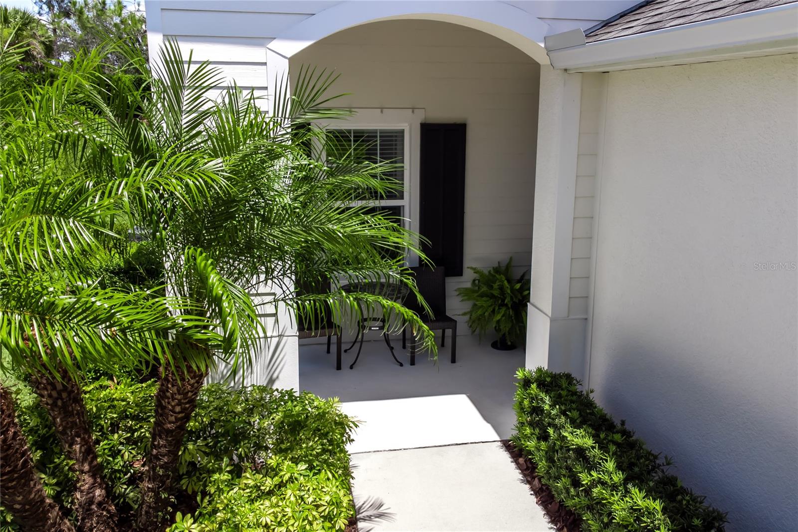 Indulge in the epitome of serenity within this exquisite 2017 abode, gracefully nestled in an extraordinary community. Concealed within a tranquil nook on a premium plot, shielded from future development, this home offers unparalleled seclusion. As you traverse the charming front screened porch and enter the impeccably upgraded interiors, prepare to be captivated by the open floor plan that beckons you inside. The Neal Communities Tidewater MAINTENANCE FREE model boasts 2 bedrooms, 2 bathrooms, and a versatile den/office space. Revel in the opulence of this dwelling, adorned with lavish enhancements, including refined tile flooring throughout, resplendent granite countertops, sleek stainless steel appliances, a gas stove for culinary mastery, artfully staggered kitchen cabinets with crown molding, and lofty 9.4ft ceilings. It is truly a flawless work of art.
The tranquil master bedroom unveils a private sanctuary, adorned with dual sinks, ample walk-in closets, and an invigorating stand-up shower. Transition through the sliding doors from the great room and behold your very own sanctuary in the backyard. An elongated lanai and cozy seating area establish an idyllic backdrop for memorable family barbecues and entertaining guests. Within the environs of Silverleaf, the esteemed community embracing this gem, an array of splendid amenities awaits your pleasure. A clubhouse, fitness center, inviting swimming pool, playgrounds, dog parks, and nature trails beseech you to explore and delight in their offerings. Meandering sidewalks that wind throughout the neighborhood invite leisurely strolls or moments of quiet contemplation while observing the captivating local wildlife.
Embrace the convenience bestowed upon you, for this home resides in close proximity to an outlet mall, a plethora of dining establishments, exceptional golf courses, shopping meccas, and pristine beaches. Moreover, the nearby Fort Hamer bridge ensures effortless commuting to the vibrant Lakewood Ranch locale. Immerse yourself in absolute serenity and discover the harmonious coexistence of nature and contemporary living in this exceptional residence.