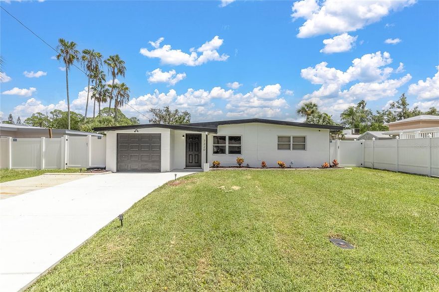 Charming lakefront home in the heart of New Port Richey! This 2-bedroom, 1-bath residence offers 936 sq ft of living
space plus a versatile bonus room overlooking the water. Built in 1958 with solid block construction, the home features
a bright living area, updated laminated/tile flooring, and central air. Gorgeous modern kitchen featuring brand-new
white shaker cabinets with sleek black hardware, complemented by stunning quartz countertops with bold waterfall
veining for a true designer touch. The full-height glossy subway tile backsplash adds texture and brightness, perfectly
paired with stainless steel appliances including a range, built-in microwave, and dishwasher. A deep stainless steel sink
with a matte black pull-down faucet offers both style and functionality. Recessed LED lighting illuminates the space,
while the elegant marble-look tile flooring ties the design together. This kitchen is a perfect blend of contemporary
elegance and everyday practicality, ready for both gourmet cooking and stylish entertaining. The backyard opens to
serene lake views and is perfect for relaxing or entertaining. It has a 1-car attached garage, no HOA or CDD, and a
golf-cart friendly neighborhood close to beaches, parks, shopping, hospitals, and Tampa International Airport. The
home comes with a one-year Home Warranty, with an accepted contract before September 5, 2025.