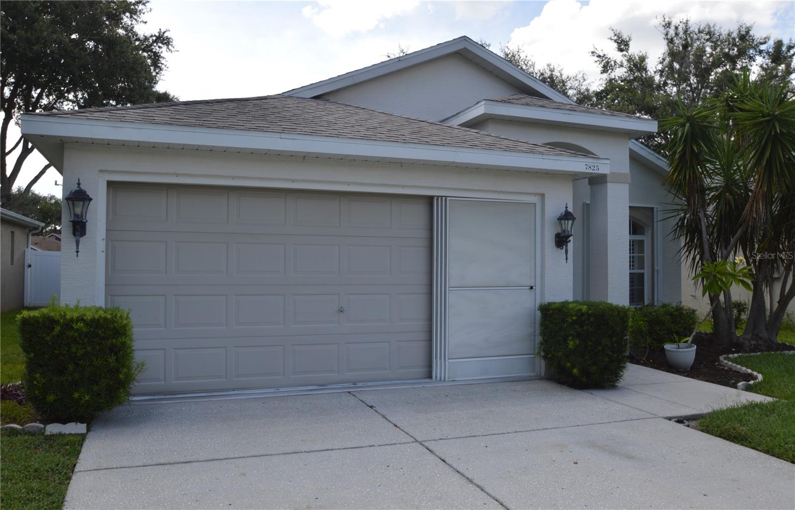 Move In Ready with a Quick Close! This charming 3-Bedroom, 2-Bath, Heated Pool Home is priced for a quick sale! This well-maintained property is located in the gated community of Windsor Place at River Ridge in New Port Richey. The home features an open-concept living space, plantation shutters, a spacious eat-in kitchen with modern appliances and a split-bedroom layout for added privacy. The primary suite includes a walk-in closet and an en-suite bath. Feel safe during inclement Florida weather, as the home includes electrically operated, roll down hurricane shutters on the front door as well as the sliding glass doors leading from the Great Room to the lanai/pool area. The remainder of the widows can be secured with the attached sliding shutters. Additionally, the home is pre-wired for the included, plug-in portable generator. Located in a quiet, secure neighborhood with access to community amenities and just minutes from shopping, dining, and recreation—this home offers comfort, space, security and convenience.