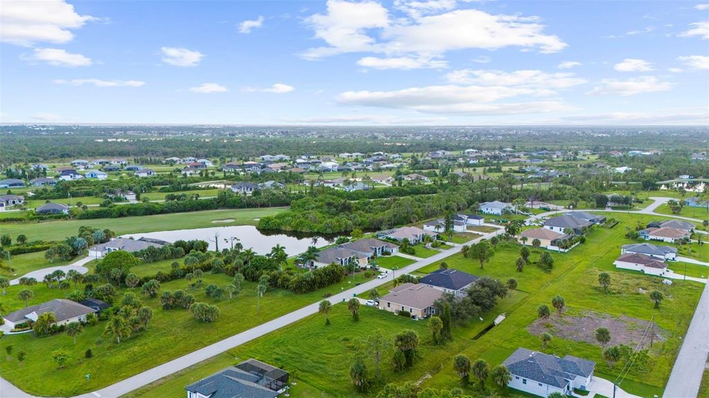 Photo of 70 Tee View Road, Rotonda West, FL 33947 (MLS # N6134285)
