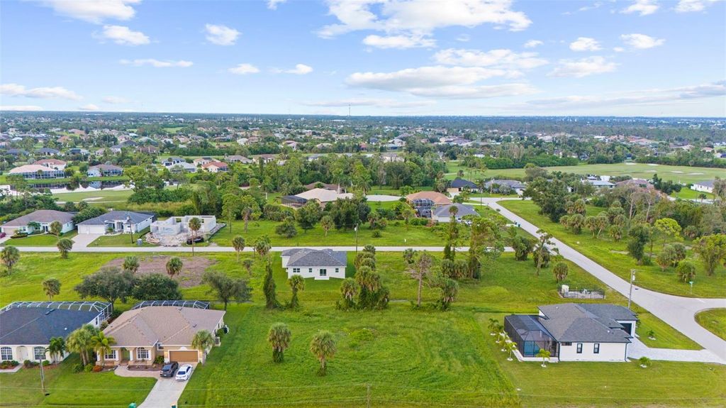 Photo of 70 Tee View Road, Rotonda West, FL 33947 (MLS # N6134285)