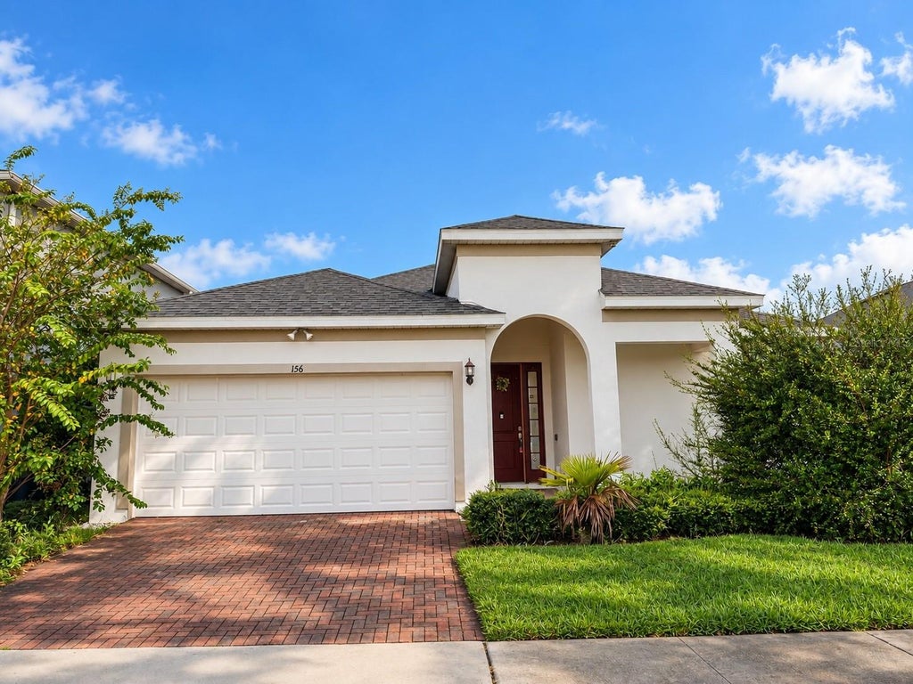 Photo of 156 Trinity Ridge Circle, Davenport, FL 33897 (MLS # O6446907)