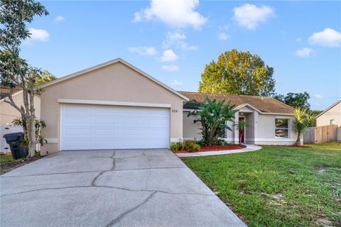 Photo of 324 Oakpark Loop, Davenport, FL 33837 (MLS # O6357475)