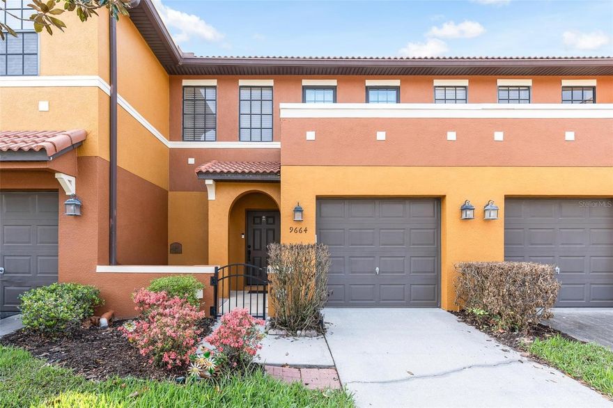 Welcome to 9664 Doris Ln in the highly sought-after Tivoli Gardens community of Orlando. This beautifully maintained 2-bedroom, 2.5-bath home offers the perfect combination of comfort, functionality, and location, making it an ideal choice for a variety of buyers. Inside, you’ll find a spacious open floor plan designed for both everyday living and entertaining. The kitchen flows seamlessly into the main living areas, creating a bright and inviting atmosphere filled with natural light—perfect for hosting guests or enjoying quiet nights at home. Upstairs, both bedrooms are generously sized and feature their own private en-suite bathrooms, offering comfort and privacy for everyone. A convenient half bath on the main floor adds ease for guests and enhances the home’s overall functionality. Located in the desirable Lee Vista area of Orlando, this gated community is perfect for families and those seeking an active lifestyle. Residents enjoy access to fantastic amenities including a basketball court, a gorgeous community swimming pool, and a playground—creating a true neighborhood feel with something for everyone.  Thoughtful upgrades throughout the home provide added value and peace of mind, including new windows installed in September 2025, new carpet in December 2025, and a serviced garage system with updated seal, spring, cable, and rollers completed in May 2025. Additional updates include new front door weather stripping and seals (October 2025), brand new toilets, a new kitchen light fixture, and stylish patio tile. The HVAC system was replaced in 2019, and the roof is covered by the HOA—making this home as practical as it is move-in ready. Whether you’re a first-time buyer, downsizing, or looking for a strong investment opportunity, this move-in ready home checks all the boxes. With its prime location near major highways, shopping, dining, and Orlando International Airport, this is one you won’t want to miss.