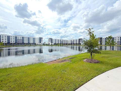 Photo of 5587 Millenia Boulevard #207, Orlando, FL 32839 (MLS # TB8515925)