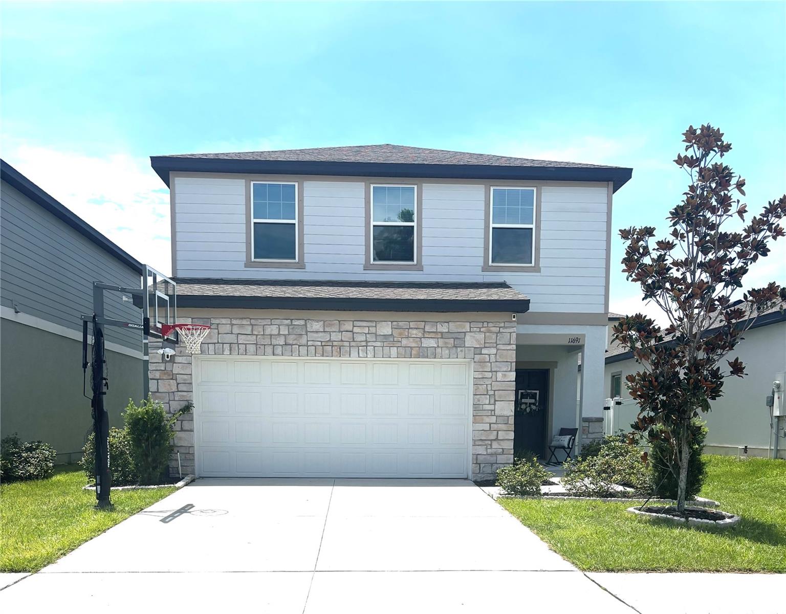 Take a look at this beautiful home, enjoy low HOA fees and NO CDD! Boasting of granite counter tops, luxury vinyl floors (2nd floor bedrooms are carpeted), 1st Floor BR could be used as an office, smart home upgrades, in-ground Basketball hoop, fully fenced in backyard with playground. Close to I-75 with a quick trip down the new 52 for easy access! All of your shopping needs right around the corner! Enjoy the NEW community pool and walking trails, and take Fido to the community dog park! Everything has already been added and upgraded to make this home a great place to call home! Make an appointment today!