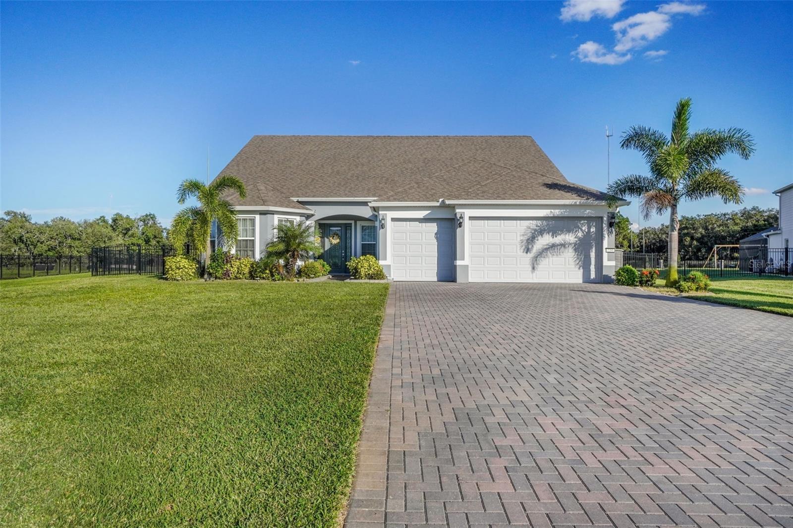 Resort-Style Living with Solar Panels Paid Off At Closing!
This like-new 4-bedroom, 4-full bath home in the exclusive Lake Pickett Sunset Preserve community truly has it all! Pull up to the oversized driveway and 3-car garage that provides parking for up to 12 vehicles—perfect for entertaining or large families.
Situated on a half-acre lot, this home features a stunning heated salt cell pool and spa, lush landscaping with fruit trees, and countless upgrades throughout. Inside, enjoy a gourmet kitchen with a custom pantry offering exceptional storage, a custom laundry room with ample hanging and folding space, and a spacious primary suite with a designer walk-in closet featuring abundant hanging and drawer space. The built-in entertainment center in the family room adds an elegant touch to this open, inviting layout.
Upstairs, you'll find a large loft ideal for game room, media area or home office, plus a generously sized bedroom and full bath.
Community amenities include a private boat ramp with lake access, open-air pavilion, and playground—perfect for Florida living at its best. Conveniently located near Top rated schools, UCF, major shopping, dining, and easy access to major highways 408 and 417, this home combines comfort, convenience, and luxury in one perfect package.
Too many upgrades to list—come see this stunning home for yourself!