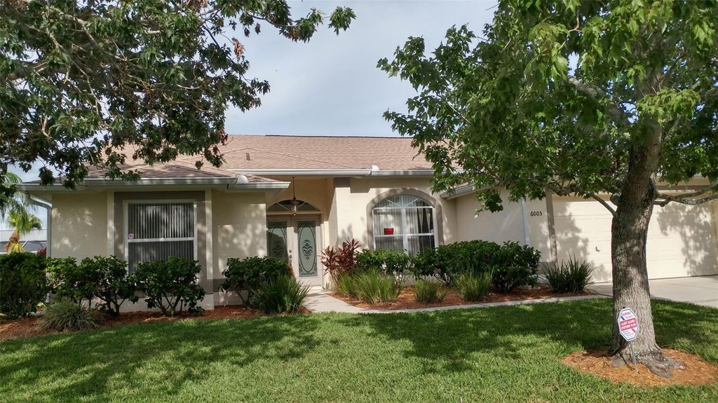 Photo of 6005 Cedarwood Lane, Bradenton, FL 34203 (MLS # A4666570)
